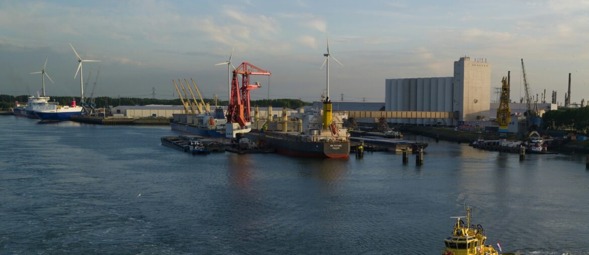 Port with grain elevators and cranes